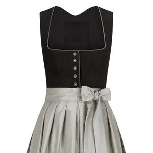 Detailed view of an elegant black and silver German Oktoberfest Dirndl dress with a bow