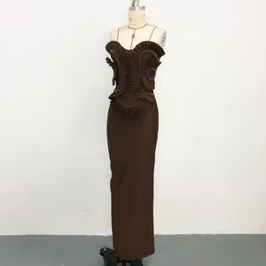Elegant brown bandage maxi dress with symmetrical ruffles and handmade beading details