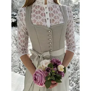 Robe Dirndl élégante pour l'Oktoberfest avec chemisier en dentelle blanche et corsage gris