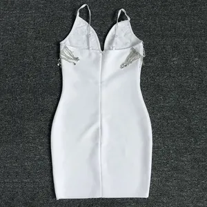 Back view of sexy white bandage mini dress with sparkling rhinestone tassel details