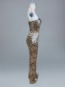 Detailed side view of a floor-length leopard print dress on a white mannequin