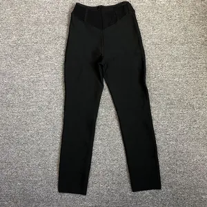 Vue détaillée de ce pantalon bandage noir élégant à taille haute pour femmes chic