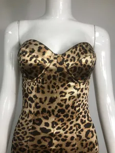 Detailed view of sexy leopard print corset dress with a deep V-neckline and slim fit