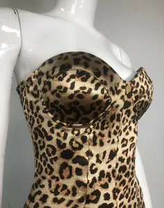 Close-up view of a sexy leopard print bodycon dress showing sweetheart neckline detail
