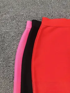 High elasticity bandage bodycon pencil skirt available in pink, black and red colors.