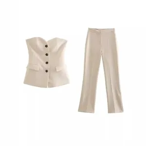 Chic cream two-piece set with strapless corset top and high-waist pants