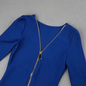 Close-up detail showing the high-quality gold zipper on a royal blue bandage bodycon dress