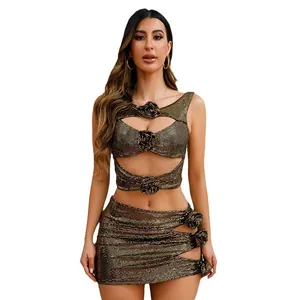 Sleeveless sequin two-piece set featuring cutout crop top and mini skirt in metallic gold