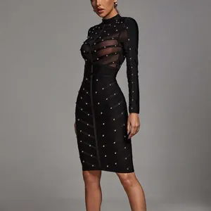 Black long-sleeved bandage dress featuring sheer mesh panels and heavy gold studs