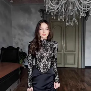 Elegant long sleeve contrast dress with intricate black floral lace top and smooth satin skirt