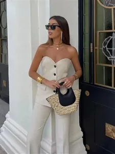 Chic two-piece set featuring a strapless buttoned vest and matching straight-leg trousers