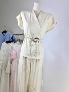 Elegant cream sleeveless blazer vest and high-waist straight-leg trousers two-piece set