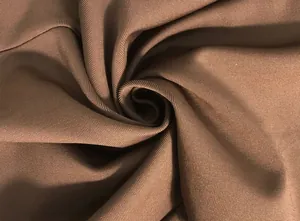 Detailed macro shot showing the premium thick ribbed bandage dress fabric texture.