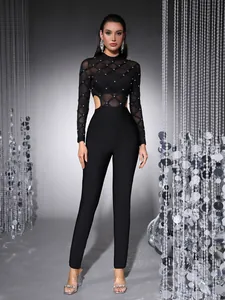 Sexy black beaded mesh long sleeve jumpsuit with waist cut-outs and bandage pants
