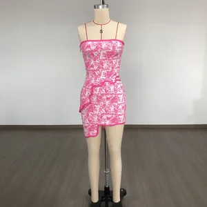 Detailed view showing the rose red jacquard pattern and irregular wave hem on this dress
