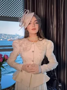 Elegant French style white peplum jacket featuring a floral collar and luxury embroidery details