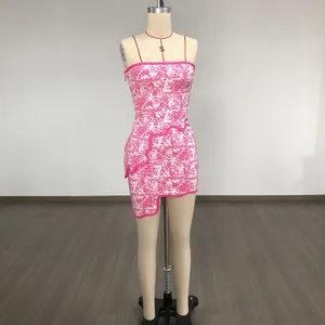 Close-up view of a pink and white jacquard irregular mini dress on a mannequin display