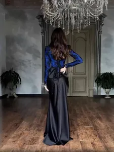 Elegant blue lace long sleeve top with black satin floor-length skirt evening dress