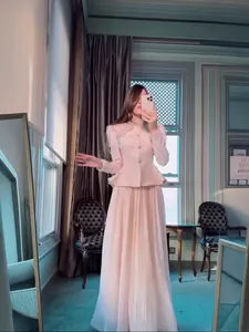Elegant French style pink two-piece set featuring a floral collar and long pleated skirt