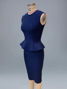 Side view of elegant navy blue bandage two-piece set on a professional dress form