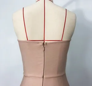Detailed back view of an elegant nude bandage dress featuring a hidden back zipper