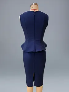 Detailed back view of a navy blue peplum bandage top and slim midi pencil skirt set.