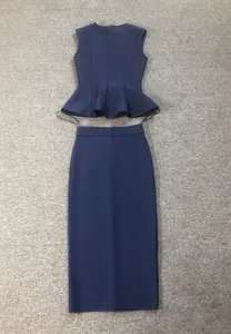 Elegant navy blue two-piece bandage skirt set featuring sleeveless peplum top and midi skirt