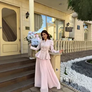 Elegant vintage pink blazer with floral embroidery and matching pleated skirt set