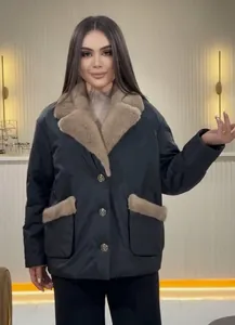 Elegant black women's winter coat with luxury tan faux fur collar and pocket details