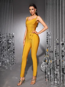 Detailed full-body view of a sexy yellow V-neck bandage jumpsuit with waist tie