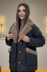 Elegant winter jacket with plush faux fur collar and decorative gold buttons