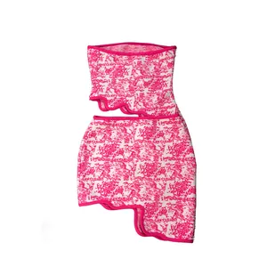 Rose red two-piece set featuring tube top and irregular mini skirt with abstract pattern