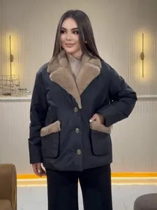 Elegant black winter jacket for women featuring luxury fur collar and gold button details