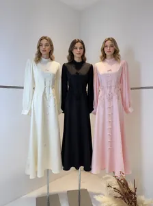 Elegante vestido de manga larga de estilo francés con encaje y malla en colores sólidos