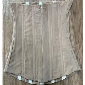 Close-up detail of beige high-elastic mesh corset top featuring vertical boning support