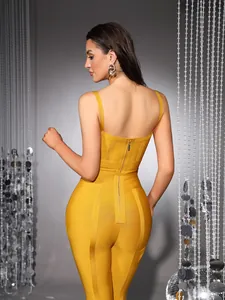 Back view of a yellow bandage jumpsuit with zipper closure and spaghetti straps