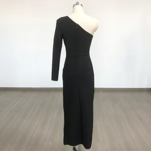 Detail of elegant black one-shoulder long sleeve bandage evening dress with back zipper