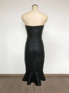 Back view of black crocodile pattern strapless mermaid dress on mannequin