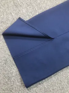 Close-up of premium navy blue bandage fabric showing high-quality stitching and texture