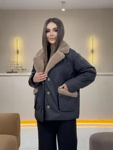 Elegant women's winter coat featuring a luxury fur collar and decorative gold buttons