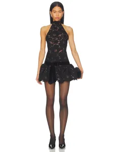 Elegant black lace halter mini dress with waist bow and eyelash lace hem detail