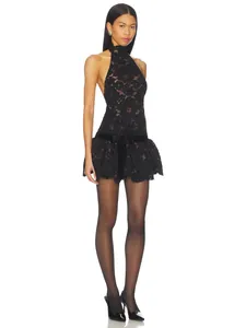 Elegant black lace halter mini dress featuring a waist bow and ruffled eyelash lace hem
