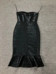 Elegant black crocodile textured bandage midi dress with strapless mermaid hem detail.