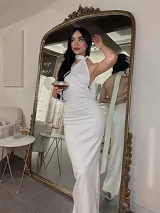 Elegant white backless halter dress with pearl beaded back and side slit