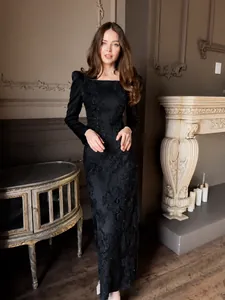 Elegant black long sleeve floor-length maxi dress with heavy floral lace embroidery
