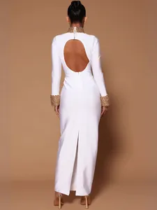 Elegant white long sleeve bandage dress featuring beaded collar and a chic open back