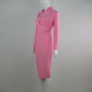 Elegant pink long-sleeved bodycon bandage dress featuring a sexy deep V-neckline detail