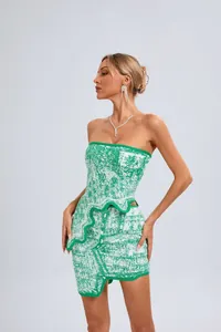 Close-up detail of the green and white jacquard two-piece set with irregular wave hemline