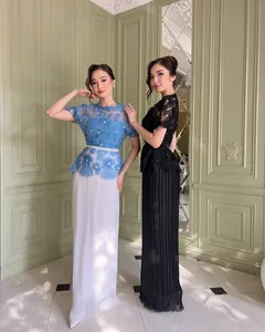 Elegant lace floral top with pleated maxi skirt in blue and black color variations.