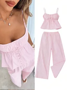 Detailed view of pink and white striped camisole crop top and matching wide-leg pants